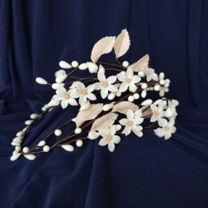 Bridal crown handmade with cold porcelain flowers, leaves and buds.