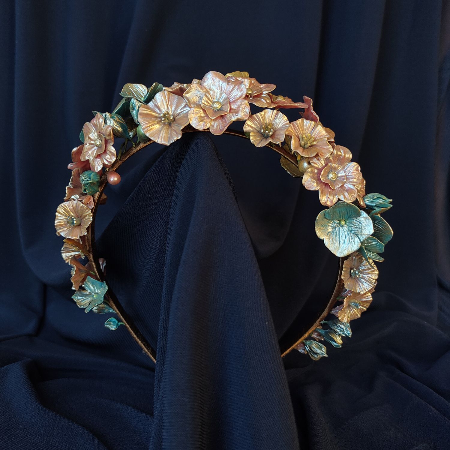 Metallic fantasy flower headband with handcrafted red and blue porcelain flowers and golden leaves.