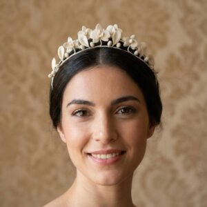 Romantic ivory bridal tiara with hand-sculpted cold porcelain orchids, leaves and buds.